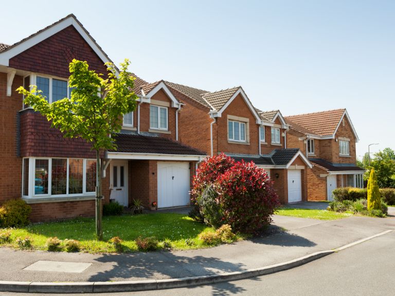 Row of well kept houses photographed from the front in the UK: Setting the right price for your property when selling is critical. Blog by Moorhouse estate agent in Four Oaks, Sutton Coldfield.